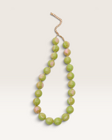 House of Holabox Sunday Best necklace featuring smooth marbled green and pink resin beads with a gold-plated chain.