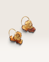 House of Holabox Walya earrings featuring layered Earthwood resin flower petals on 18K gold-plated hoops.