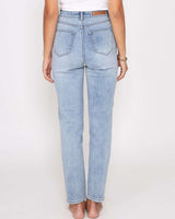 Back view of light blue high-rise Olivia mom jeans with a relaxed fit and ankle-length cut on a model.