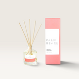 Palm Beach Collection 50ml Summer Peach mini reed diffuser with glass bottle, wooden reeds, and pink gift box.
