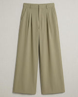 Sage green relaxed-fit trousers with front pleats, side pockets, and a zip fly closure.