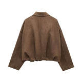 Back view of a brown suede-like bomber jacket with a relaxed fit, stand-up collar, and dropped shoulders.