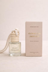 Soaked Body Bar Floral Car Diffuser with wooden lid and hanging rope filled with dried florals and fragrance
