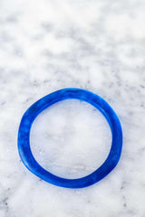 Wave Resin Stacking Bangles in assorted colors showcasing unique handmade designs for stylish layering