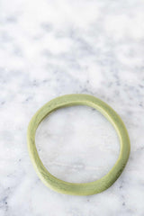Handmade Wave Resin Stacking Bangles in assorted colors, perfect for layered, textured looks and self-expression.