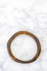 Colorful handmade Wave Resin Stacking Bangles in assorted hues showcasing unique textures and sizes
