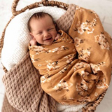 'Snuggle Hunny’ Organic Muslin Wraps
Light weight, breathable and easy to use. They are super soft and gentle on baby’s skin.  
A simple and beautiful way to swaddle your baby. This would make the perfSnuggle Hunny Kids